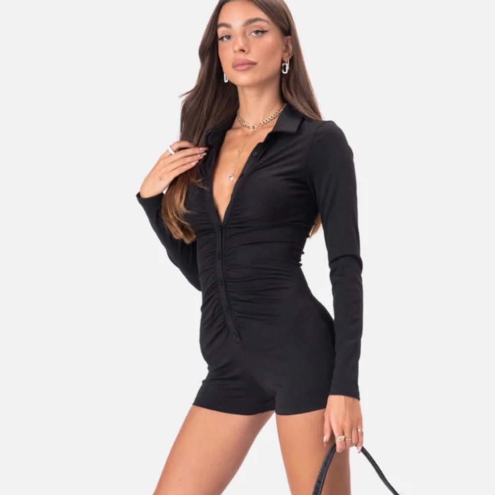 Adika ruched front black long sleeve romper with button closure